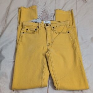 Cotton Citizen High Rise Skinny Split Raw Hem Jean in Mustard Canary Yellow